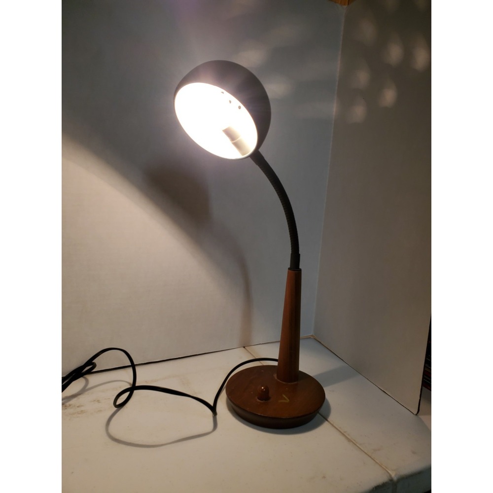 vintage 1990's Adesso table lamp features a dark metal shade, a flexible...